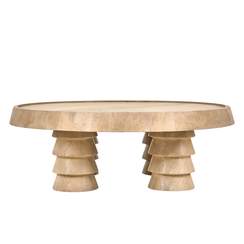 Oval coffee table with sculptural legs — Karma Inc furniture collection