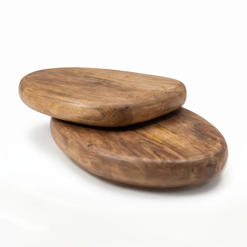 Sculptural pebble coffee tables — Karma Inc furniture collection