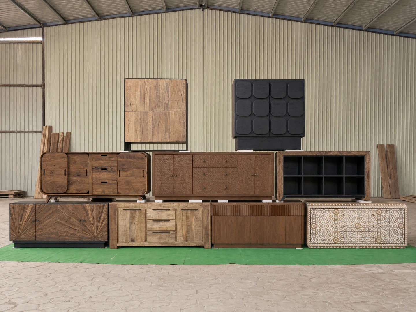 Karma Inc sideboards and cabinets arranged in a factory setting