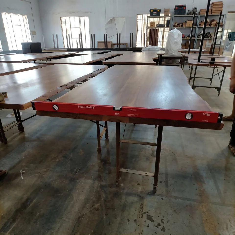Table surface and level check — Karma Inc