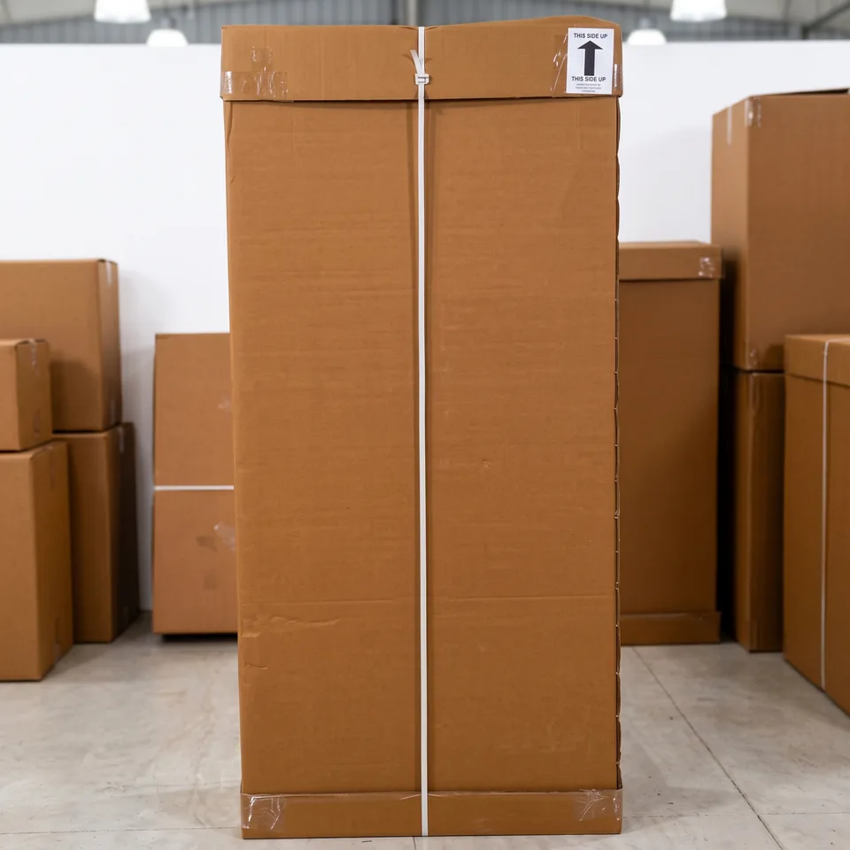 Closed carton and strapping — Karma Inc
